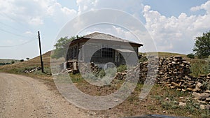 old farmer house with stone border