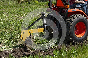 Old Farmer Plowing With A Single Bottom Plow.