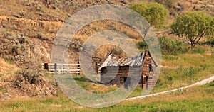 Old farmhouse in a field near Lillooet, British Columbia