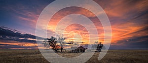 Old Farmhouse at Sunset on the Plains photo