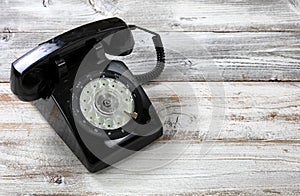 Old fashion rotary dial phone for antique technology concept in close up view