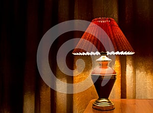 Old fashion table lamp on the table