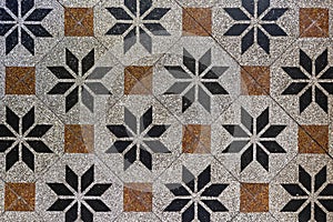 Old fashioned antique brown beige floor tiles