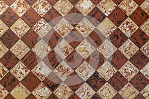 Old fashioned antique brown beige floor tiles