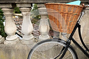 Old Fashioned Bicycle On Magdalen Bridge Over River Cherwell In Oxford With Punts Moored In Background