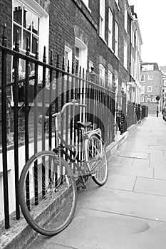 Old-fashioned bicycle in a quiet London Street