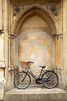 Old Fashioned Bicycle In Radcliffe Square In Oxford By University College Building