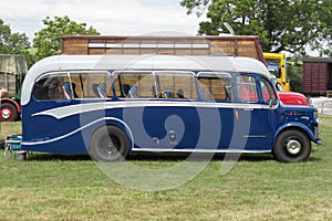 An old fashioned blue luxury coach