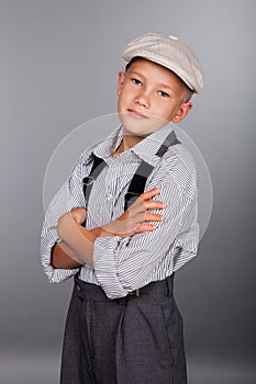 Old fashioned boy looking to the camera