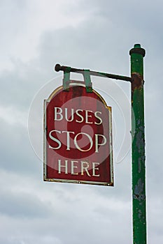 Old fashioned bus stop sign