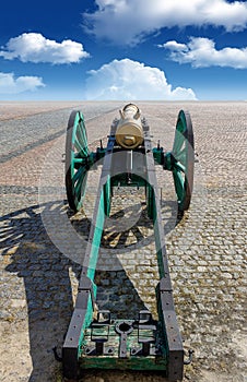 The old fashioned cannon on a square