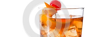 Old fashioned cocktail with orange and cherry isolated. Panoramic view