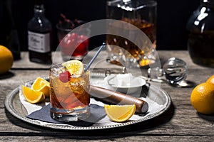 Old Fashioned Cocktail in Vintage Style Bar