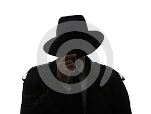 Old fashioned detective in hat on white