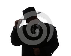 Old fashioned detective in hat on white background