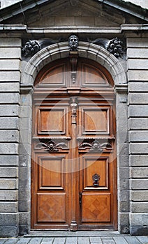 Old-fashioned door closed, St. Malo, France