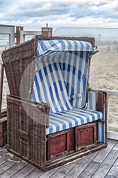 Old-fashioned Dutch beach chair near the beach