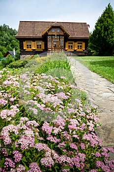 Old fashioned european log wooden cottage
