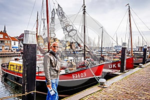 Old fashioned fishing boats in the harbor of Urk in the Netherlands