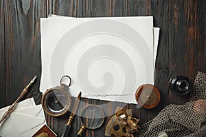 Old fashioned flat lay with letters writing accessories on dark wooden background