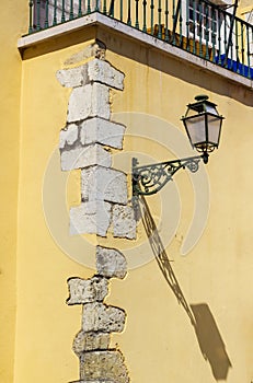 Old-fashioned forged iron lamp in Lisbon, Portugal