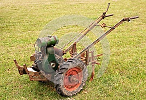 Old-fashioned garden tiller or rotovator
