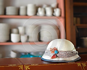 Old Fashioned Hat on Ledge in Kitchen