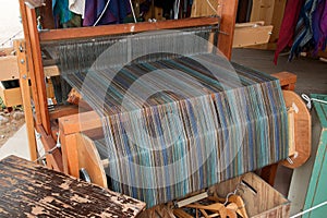 Old fashioned loom weaving machine