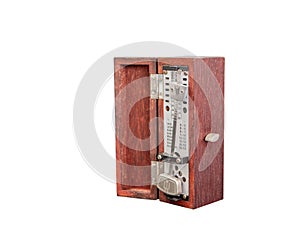 An old fashioned metronome ,made from wood box, white background