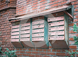 an old fashioned mileboxes on the wall