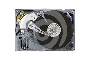 Old fashioned, open, mechanical harddisc drive, isolated on a white background