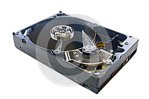 Old fashioned, open, mechanical harddisc drive, isolated on a white background