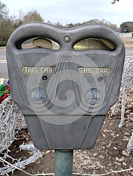 Old fashioned parking meter close up