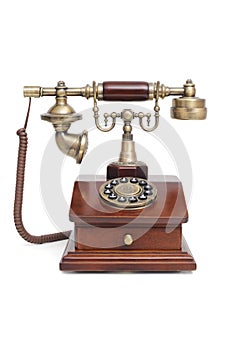 Old-fashioned phone on white isolated background