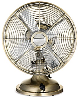 Old fashioned retro silver and brass desktop fan