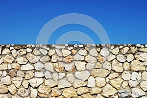 old fashioned rock wall with large rocks