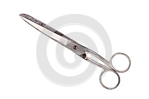Old fashioned rusty metal closed scissors white background isolated close up, vintage steel cutting tool for paper, retro shears
