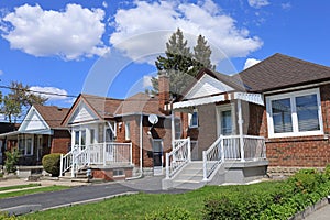 old fashioned small brick bungalows