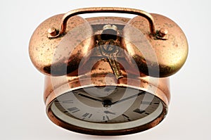 Vintage copper alarm clock