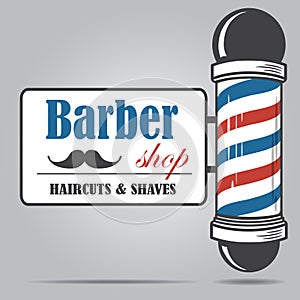 Old fashioned vintage glass Barber Shop pole with Barber Sign.