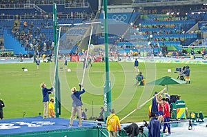 Old fashioned way on setting crossbar for pole vault