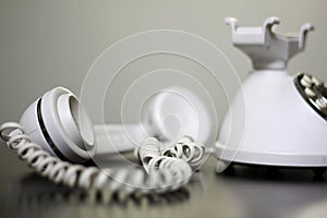 Old Fashioned White Telephone off the Hook