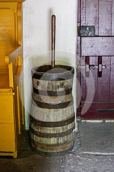 Old-fashioned wooden butter churn