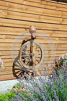 Old fashioned wooden spinning wheels, vintage yarn making equipment