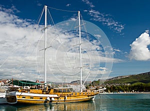 Old fashioned yacht sunny evening