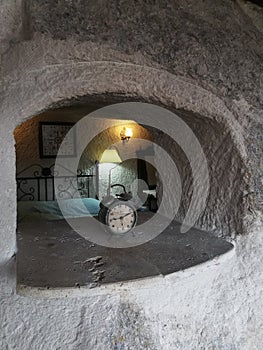 Old fasioned alarm clock in the room of rock cave hotel, Cappadocia, Turkey