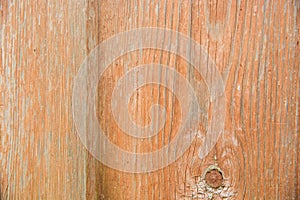 Old fence made of wooden boards. Background, texture of painted wood. Brown color