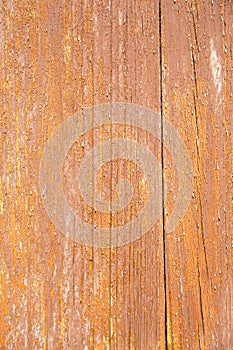 Old fence made of wooden boards. Background, texture of painted wood. Brown color