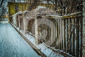 Old fence. Old abandoned dilapidated fence.