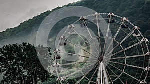 Old ferris wheel in attractions park. Krasnodar region